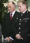 Ken Livingstone and Ian Blair wait to sign a book of condolences, 11 July 2005
