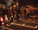 anti-war protestors block traffic outside parliament, london