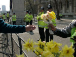 pic 5 - handing flowers over the barriers