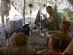 GI in military base watching DVD movies