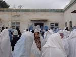 Women crowd the registration site