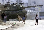 Oh! Look how those evil Palestinian kids will destroy a Merkava with stones...