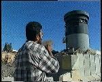 In front of an Israeli Army watch-tower - Hebron