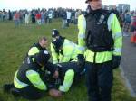 Another man wrestled to the ground and cuffed - he was shouting
