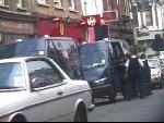 immigration vans parked near camden tube - one detainee was in a holding cage