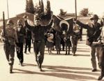 Paramilitary Sampson, in 1963, leading a triumphal procession into Nicosia