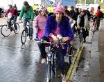 Cyclists moving off.