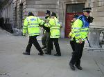 IMC-UK activist being arrested