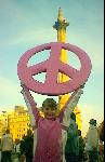 Peaceful pink protestor or golden global gangster?