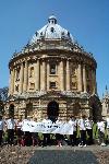 Make Poverty History campaigners form a human ring around Radcliffe Camera