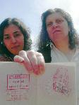 Salma Iqbal and Sandra Kane with a passport