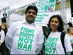 Perviz Khan and Salma Iqbal from Birmingham with Stop the War Coalition T-shirts
