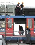 climbers on the DLR approaching protestor