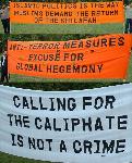 Banners held by supporters of Hizb ut-Tahrir