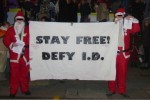 Santa Twins say no to ID Cards - holding the banner!