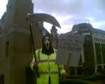demonstrator in Halloween mask
