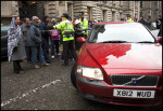 Immigration Minister 'Numpty' McNulty cowers on back seat of limo