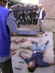 A dead body of a protester killed by the policemen during pro-democracy demonstr