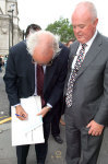 Not a demonstration? Petitioners sign on the street.