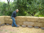 placing another bale
