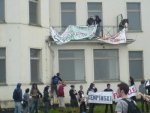 activists access one of the buildings around the hotel