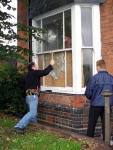 Demented locksmith smashes front window and cuts himself