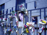 Floral tributes on Store St Garda Station 3rd June (kevin - imc éire)