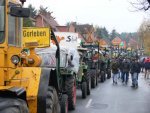 Farmers get ready to join a demonstration with their tractors.