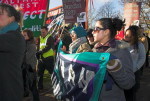 Demonstrators make their way to protest against the BNP meeting