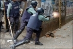 Dhaka. Policemen fire tear gas shells to disperse activists