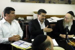 Maj. Gen. Gaby Ashkenazi, left, attending a Knesset Finance Committee meeting wi