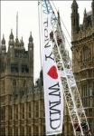 Greenpeace activists stage an anti-nuclear protest outside Parliament in London