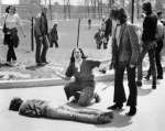 Mary Ann Vecchio gestures and screams as she kneels by the body of a student...