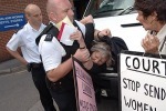 Herioc cop grabs Pauline without warning...