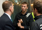 Protesters explain their position to director James Murray (3)