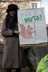 An activist holds her placard