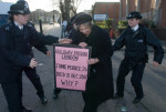 Police push Pauline Campbell away 1
