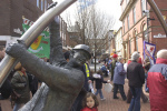 The march passes the sculpture of miners on Lord Street