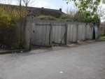 derelict semi-demolished garages