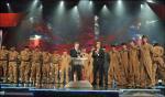 Honour... PM Gordon Brown and host Piers Morgan applaud Armed Forces heroes