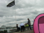 Protestors on the roof's 'tent city'