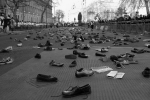 Shoes thrown by protesters litter the entrance to Downing Street. 2009