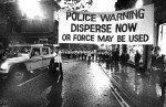 Police display a warning before attacking protesters (Photo: Tash [alan lodge])