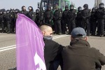 Lots of German riot cops erect their own border.