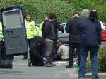 the first lock is cut after about half an hour and the pair are arrested