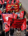 Banners of the IWW, Bristol Health Workers, and B’ham NUJ branch