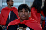 A Tamil man and a Tamil flag.