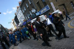 Procession through brick lane