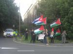 Protestors assemble on the pavement