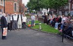 Residents and pool users congregate for the protest